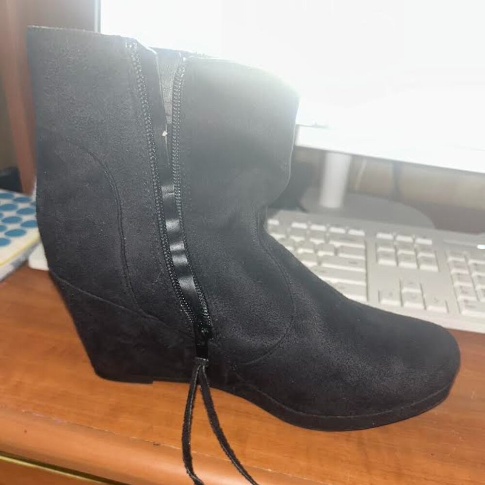 Black boots; JC brand.